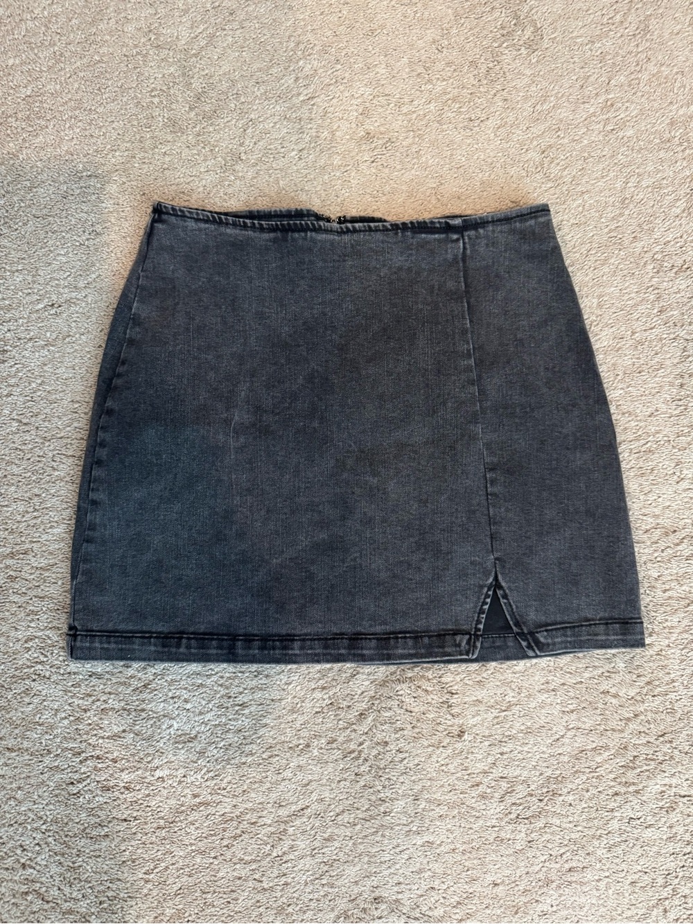 Stretchy black denim skirt